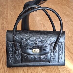 Gorgeous tooled black leather handbag